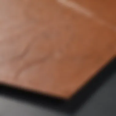 Demonstration of adhesion techniques for faux leather patches on fabric.