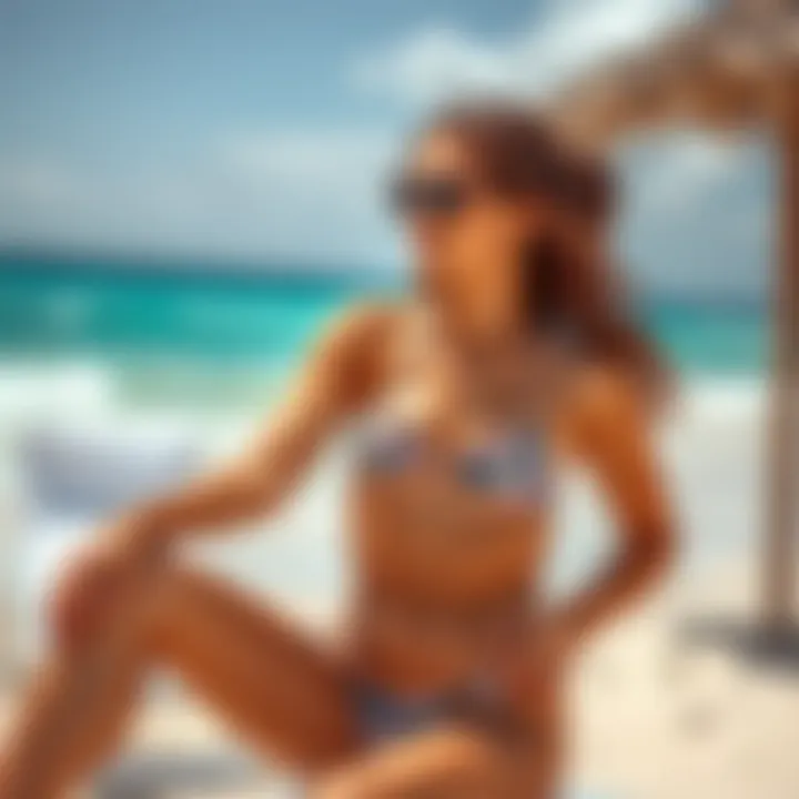 Model styling the high waisted bikini on the beach