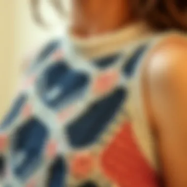 A close-up of a knit crop tank showcasing intricate patterns and textures.