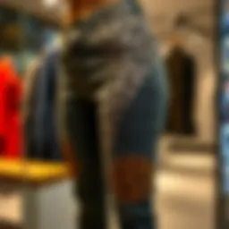 Leopard print patch jeans displayed on a stylish mannequin
