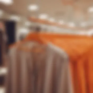 Effective Visual Merchandising with Orange Hangers Visual merchandising display utilizing orange hangers